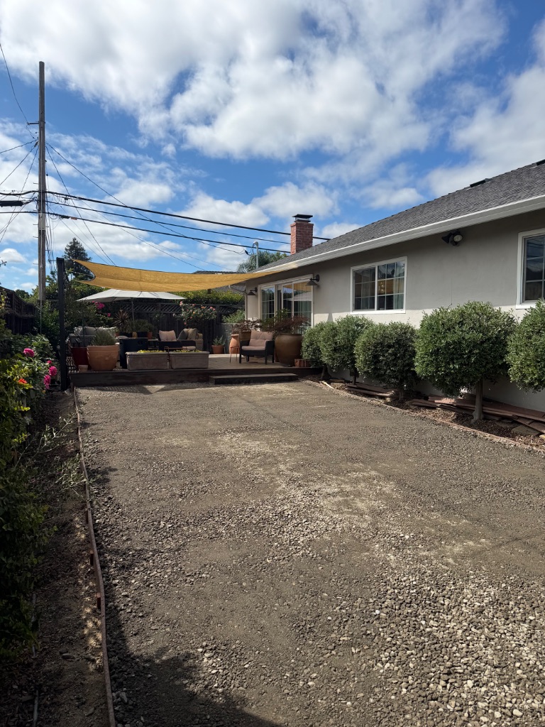 Step 1: Site assessment and gravel base preparation for turf installation — Deluxe Building Services